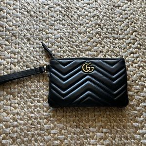 Black authentic Gucci quilted leather wristlet.